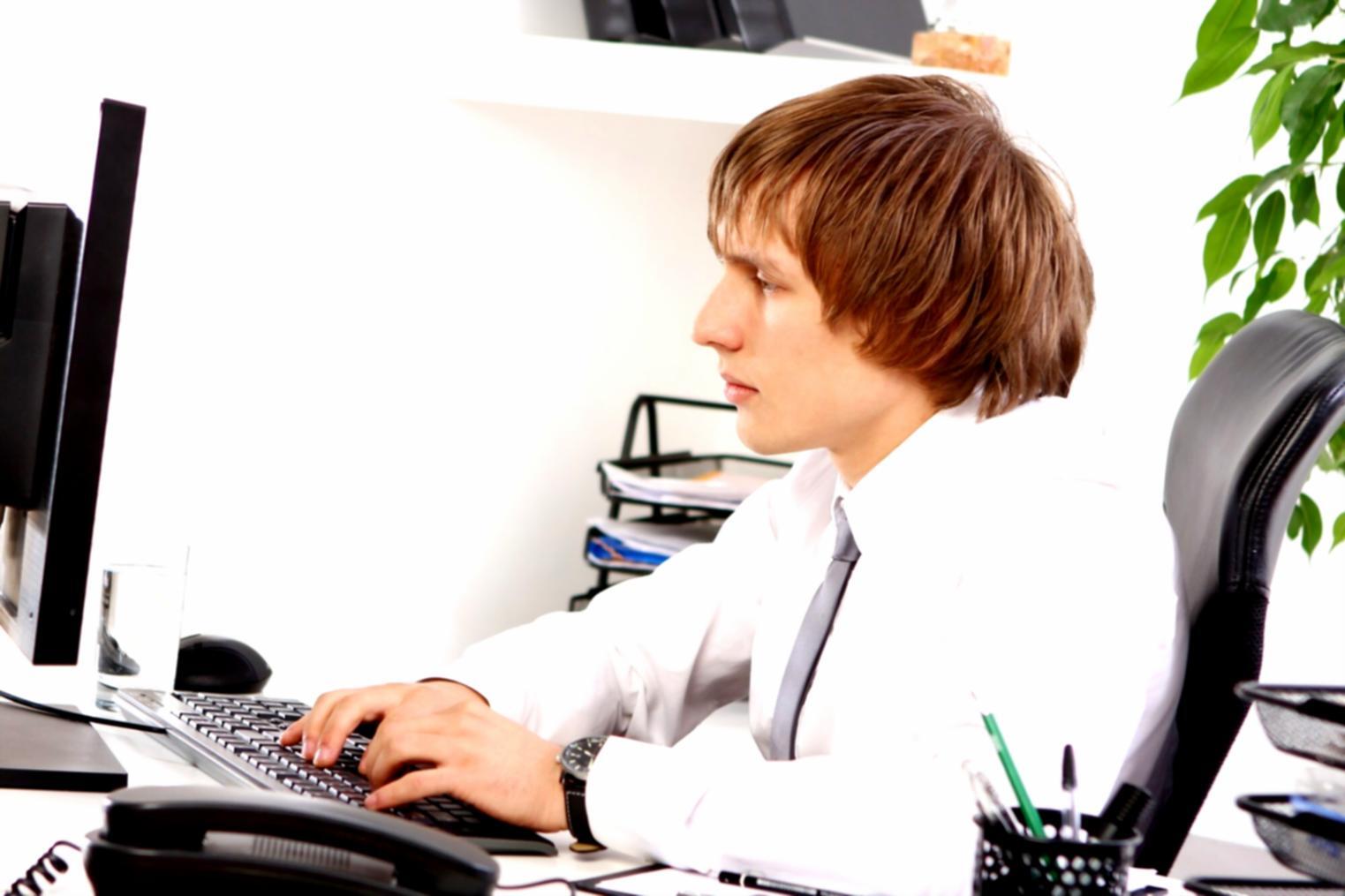 Students working together on network configuration in a hands-on learning environment